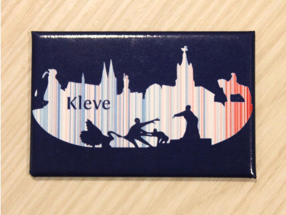 Blauer Magnet mit der Silhouette der Stadt und Warming Stripes